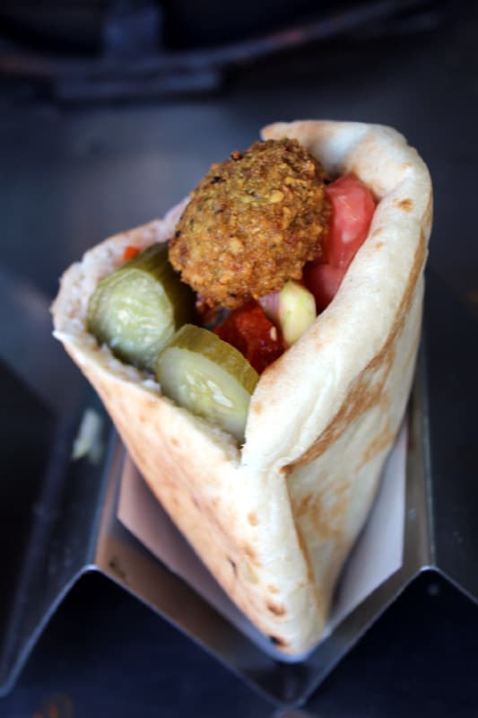 5 Traditional Israeli Dishes You Must Try When Visiting: In a pita pocket, waiting for you on the stand, is how you'll get your felafel