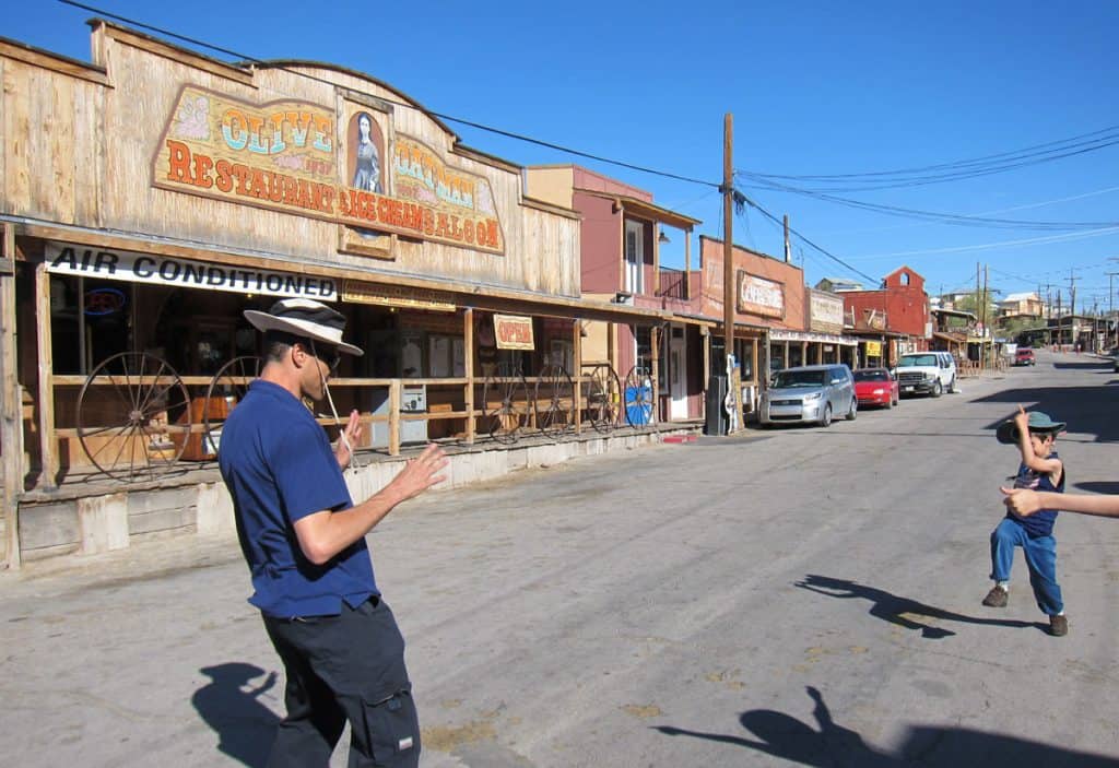The boys putting up a gunfight display at Oatman