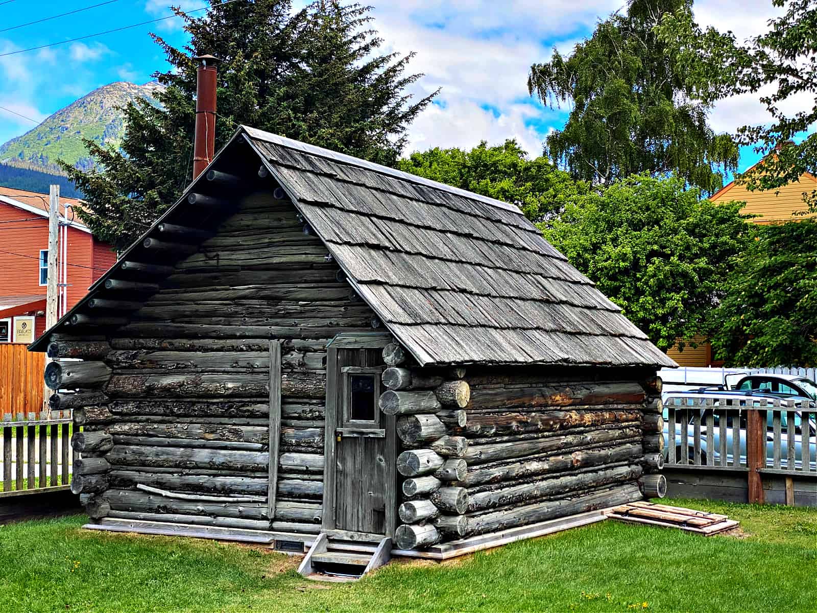 Skagway, Alaska -June 1, 2023: Moore Homestead part of Klondike Gold Rush National Historical Park. Capt William Moore settled in Skagway to capitalize on future gold rush. Log cabin oldest building.
