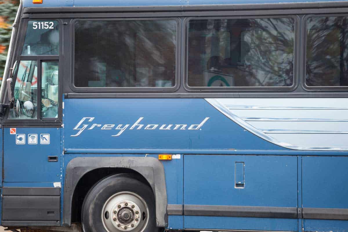 Greyhound bus leaving terminal