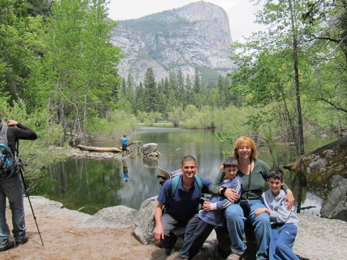 A family taking a picture at Mirror Lake Yosemite National Park, Trip Memos