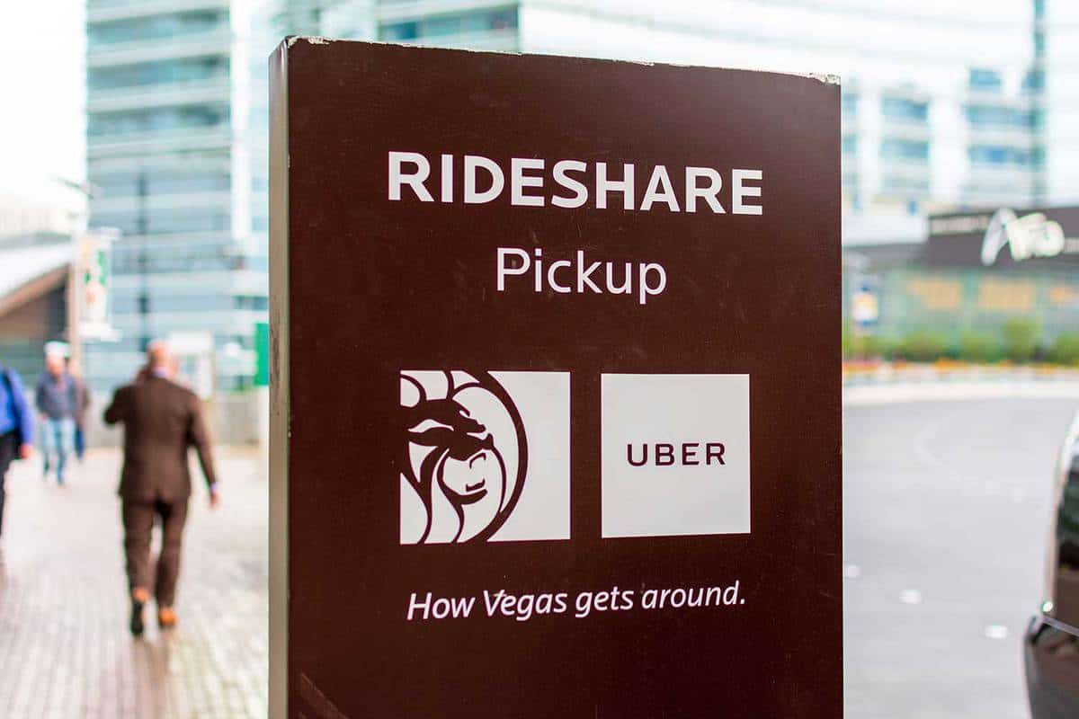 Rideshare pickup sign at designated area near the hotel entrance