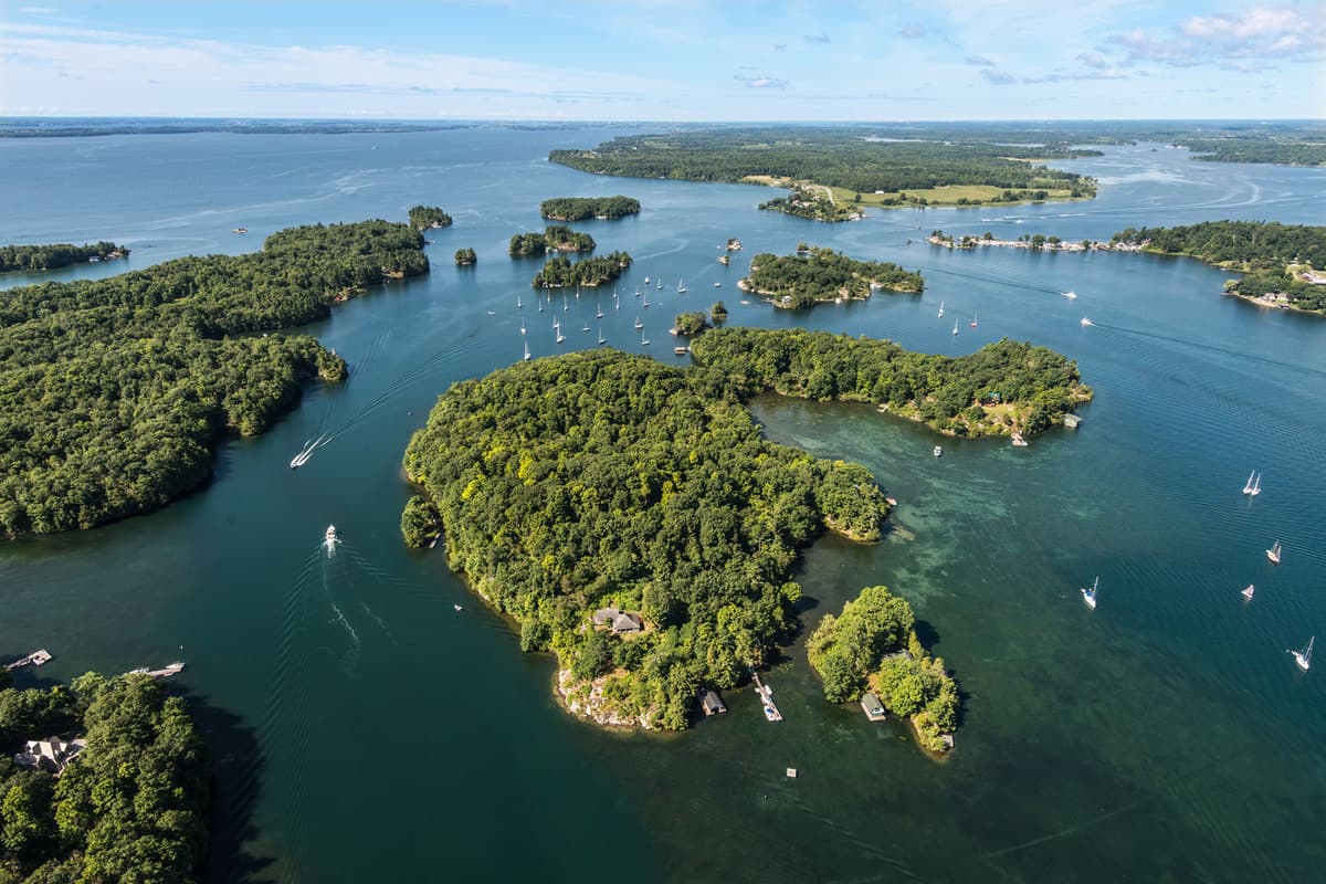 Aerial view of Thousand islands at Upstate New York with boats moving along the water