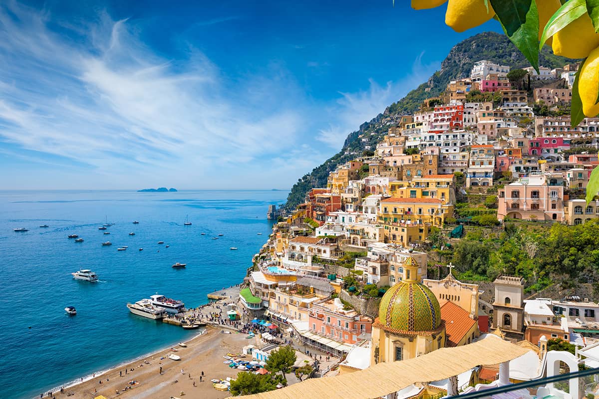 Aerial view of Positano with comfortable beach and blue sea on Amalfi Coast in Campania, Italy