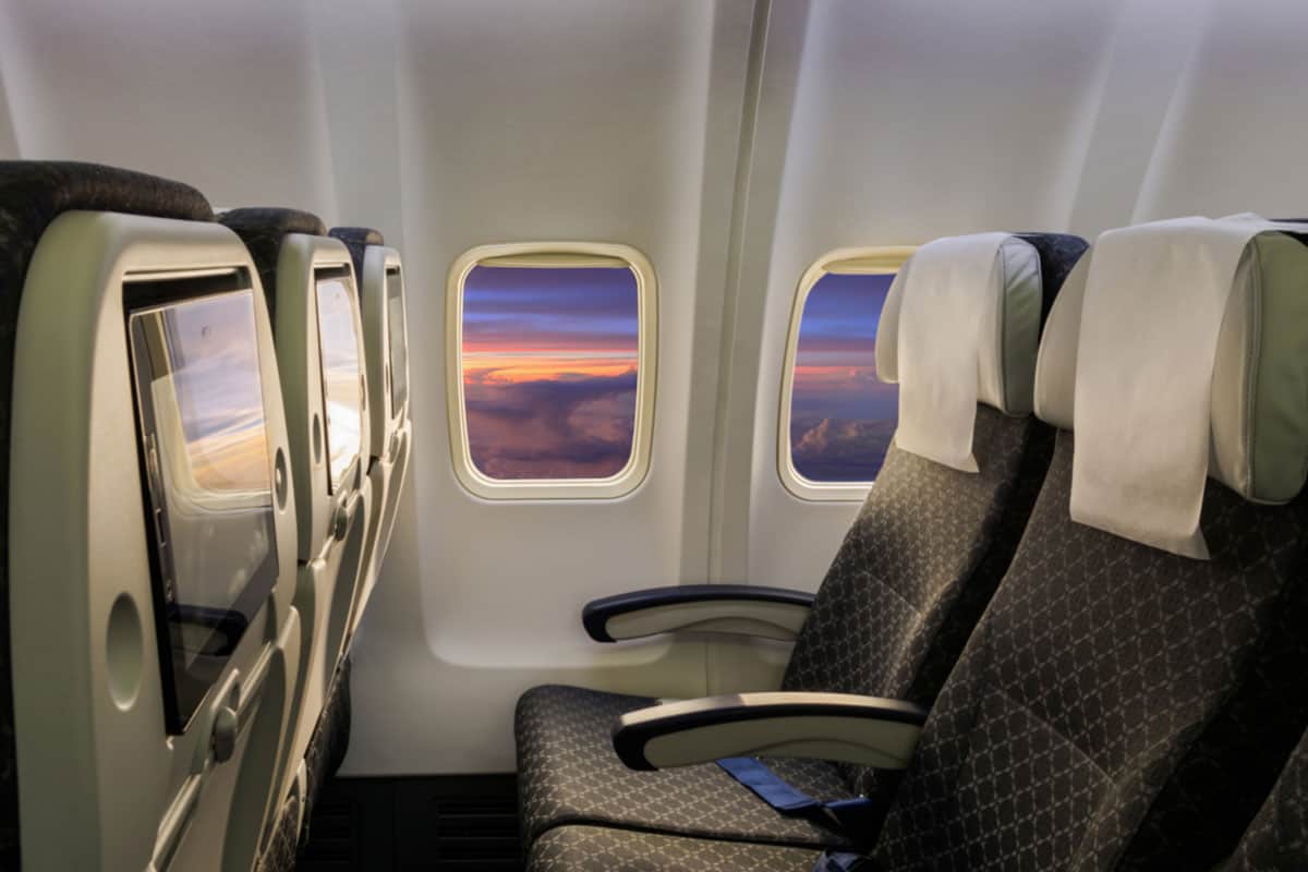 Airplane seat and window inside an airplane