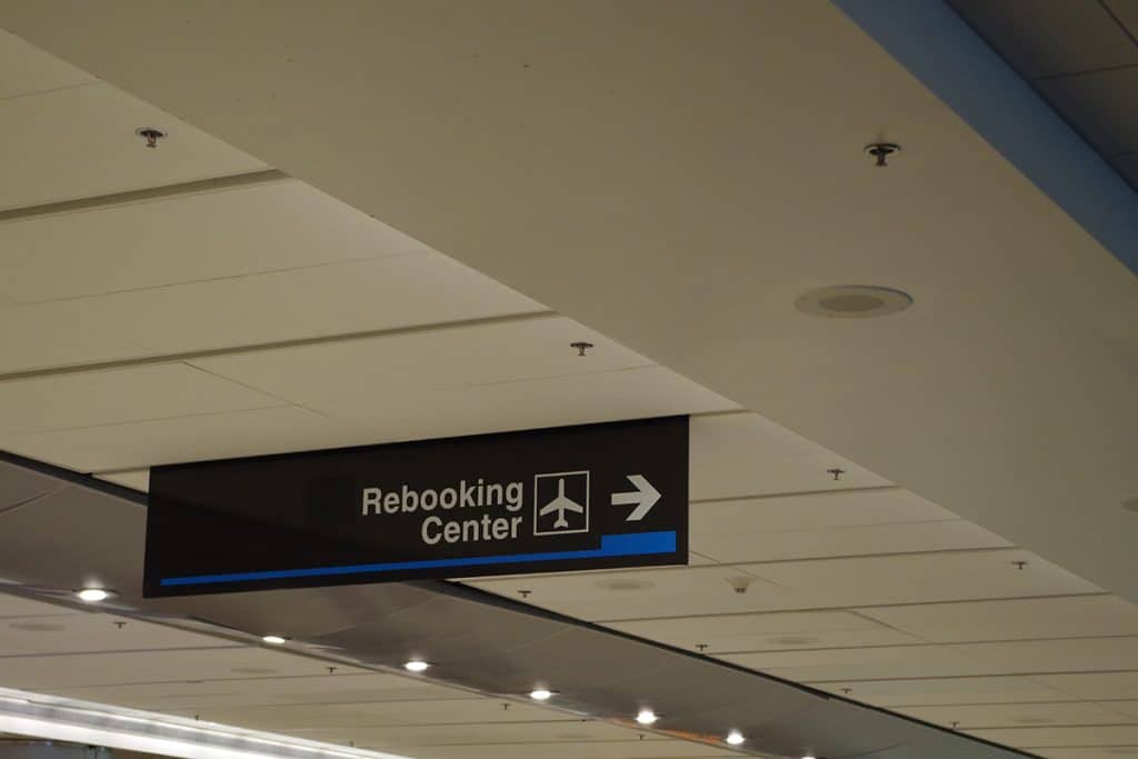 Airport rebooking center sign