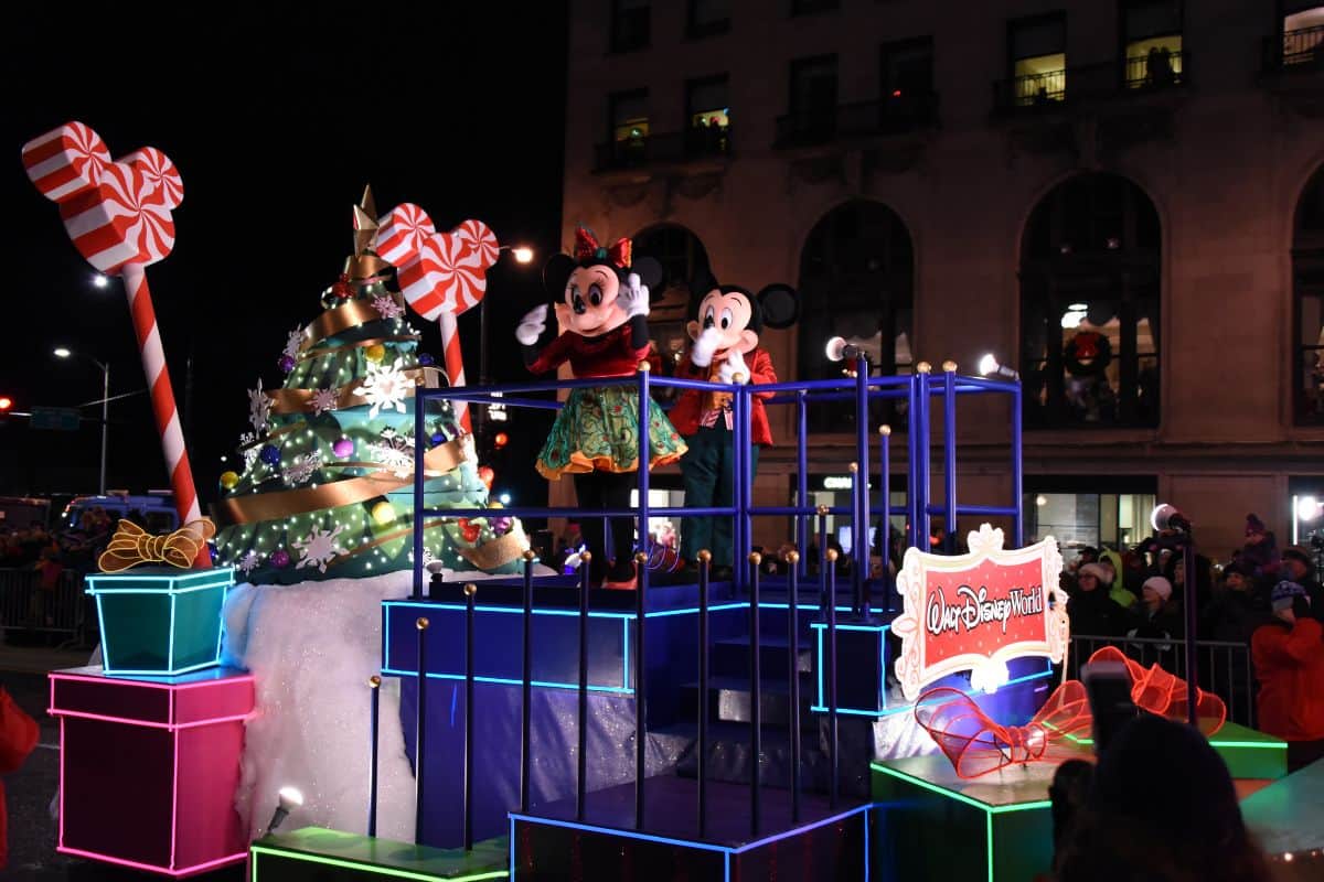 Disney's Mickey and Minnie Mouse on a parade float in the Festival of Lights Parade