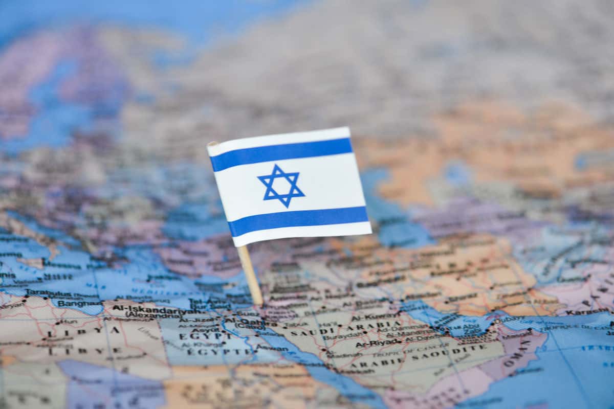 Map with flag of Israel close up point at the country of Israel, Will My Phone Work In Israel When Visiting From The US?