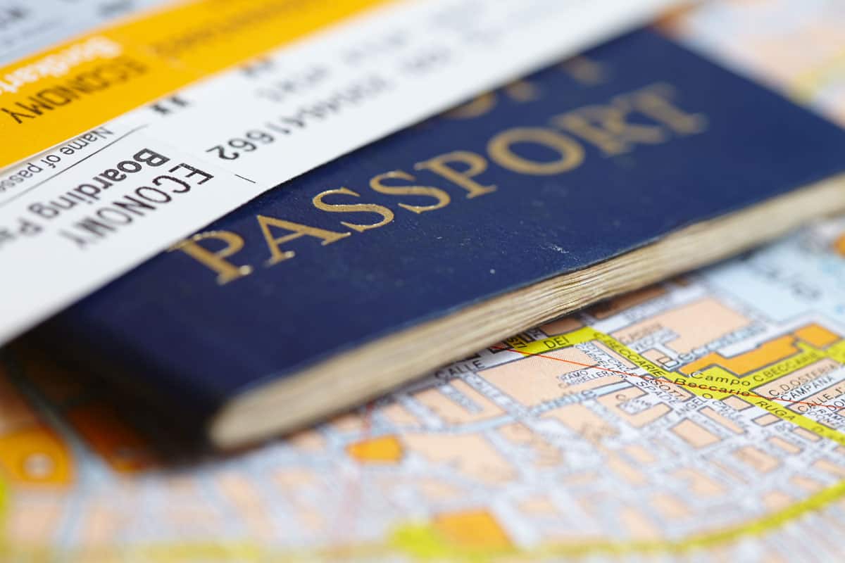 Passport on map ready for a long trip abroad