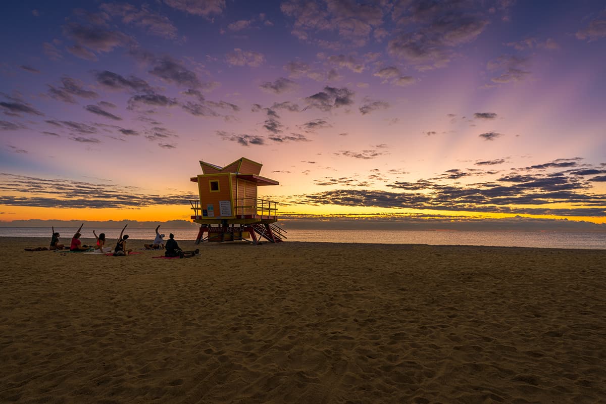 Sunrise at one of the famous life guard houses at Miami Beach