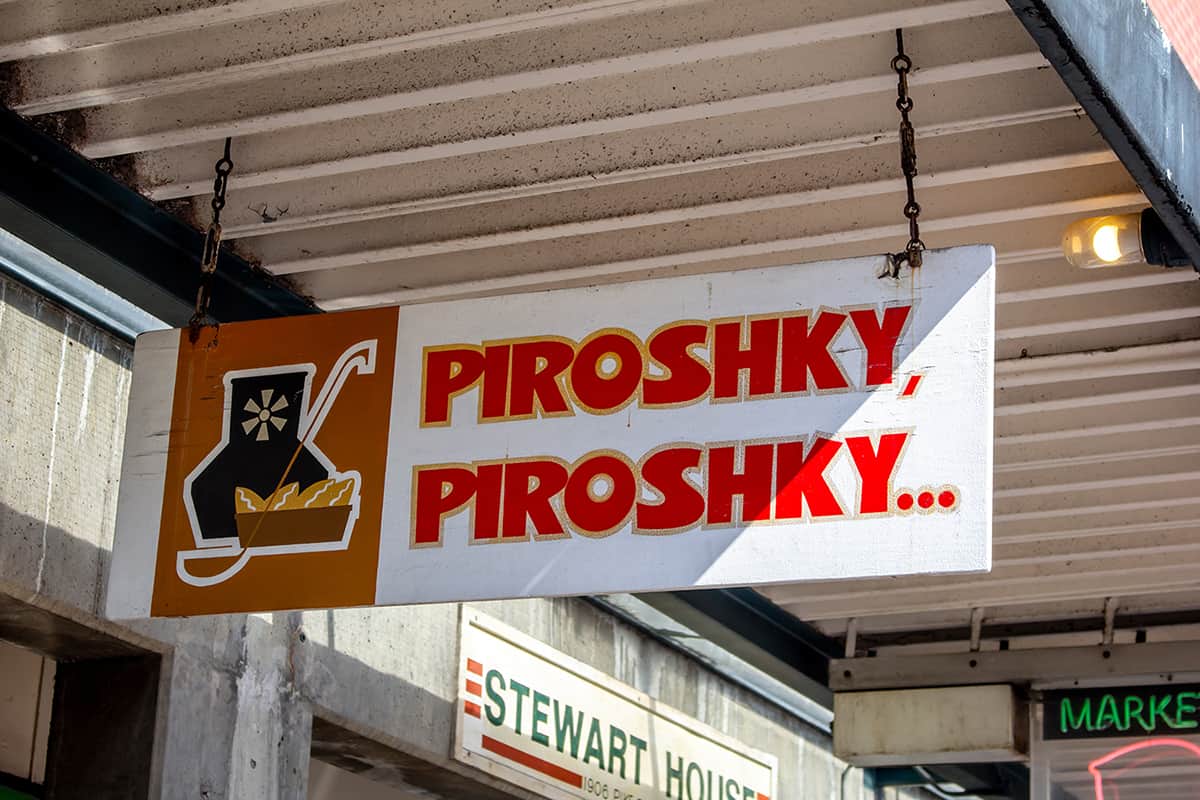 A store front sign for the bakery known as Piroshky, Prioshky