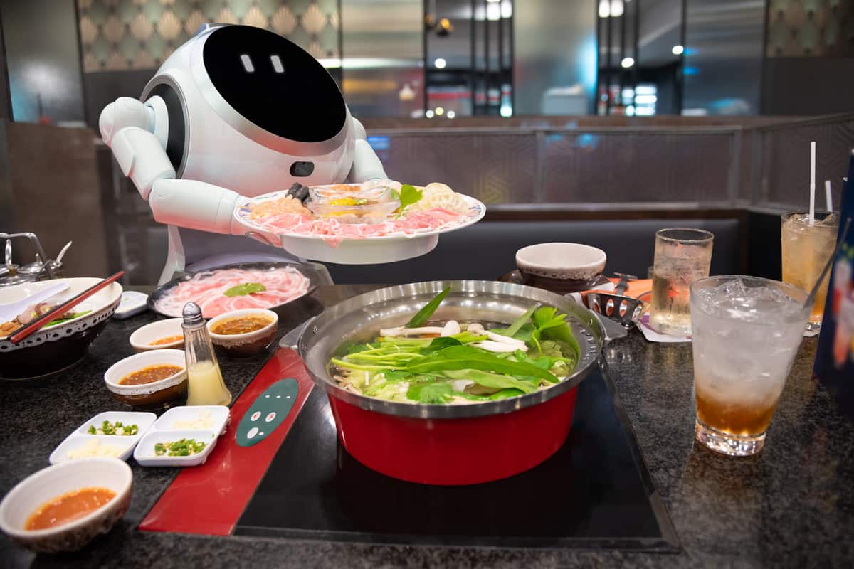 Automatic robot serving food in smart restaurant, Future technology concept