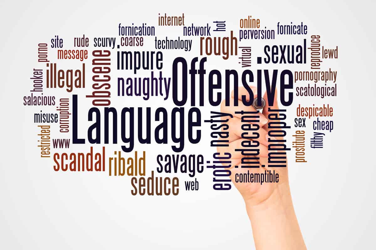Offensive Language word cloud and hand with marker concept on white background.
