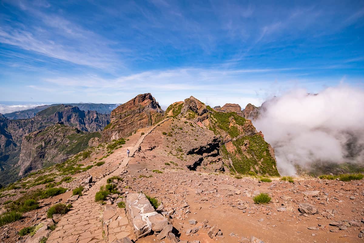 Overlooking a cloud inversion event while hiking the Pico do Ariero to Pico Ruivo mountain trail in Madeira