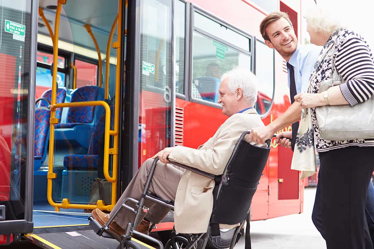 Passenger helping senior couple board bus via wheelchair ramp, Ultimate Travel Hack A Heartwarming Act Of Kindness Goes The Extra Mile