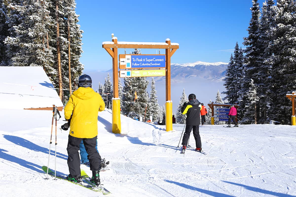 Skiers on the slopes of Breckenridge Colorado in the rocky mountains, Uncover the Best Kept Secrets of America's Top Ski Resorts