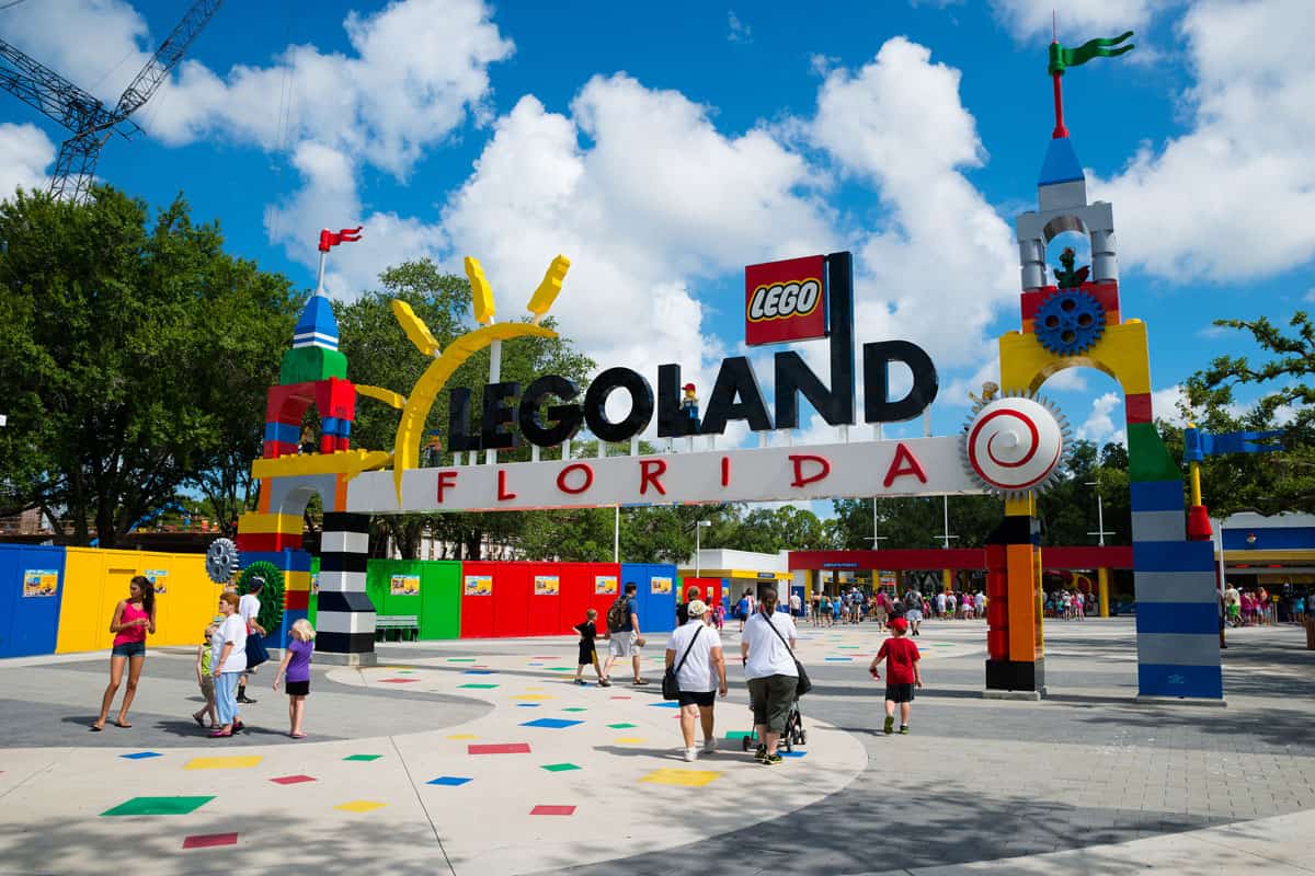 Visitors pass through the entrance to Legoland Florida in Winter Haven, FL, 