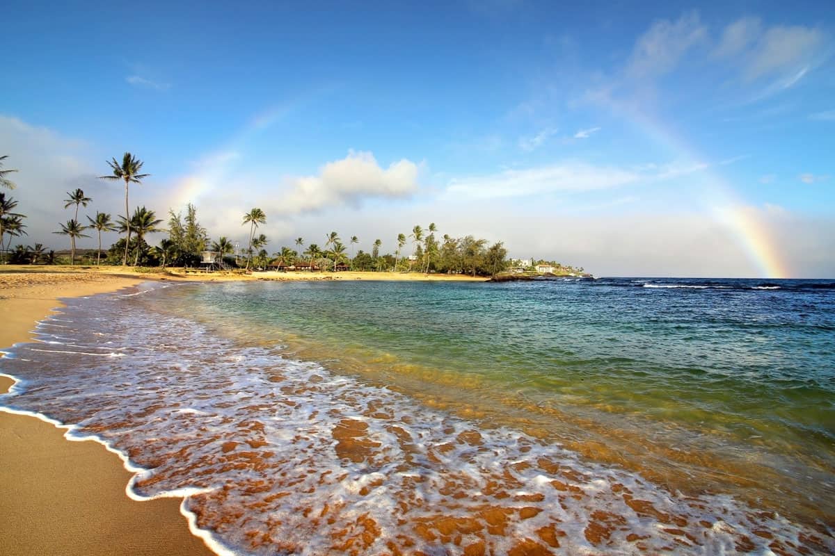the sunset rainbow on the Poipu beach, island of love, Kauai
