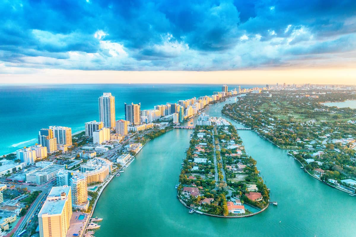 Miami Beach, wonderful aerial view of buildings, river and vegetation.
