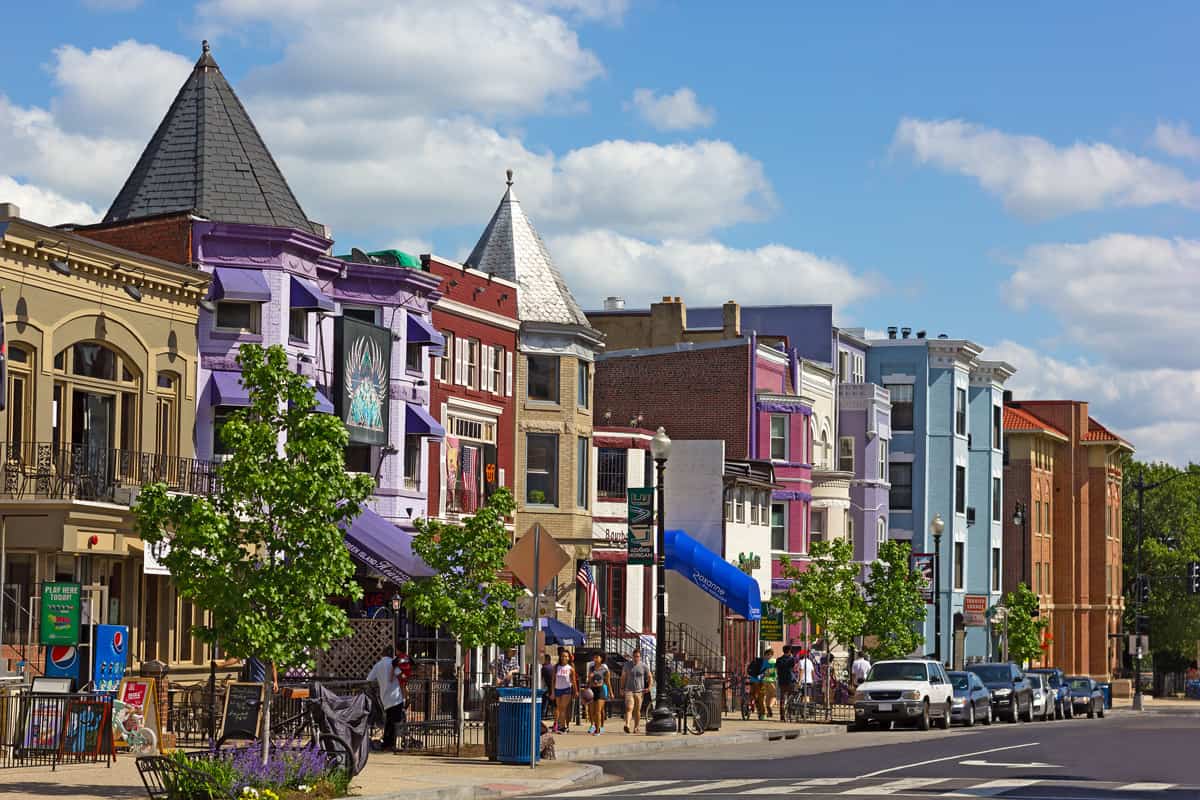 Row houses and businesses in Adams Morgan neighborhood on a perfect spring day