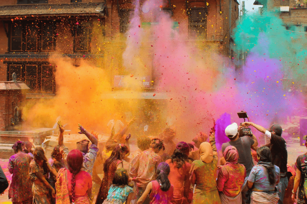 A photo showing a festive color run celebrating both Holi and St. Patrick's Day