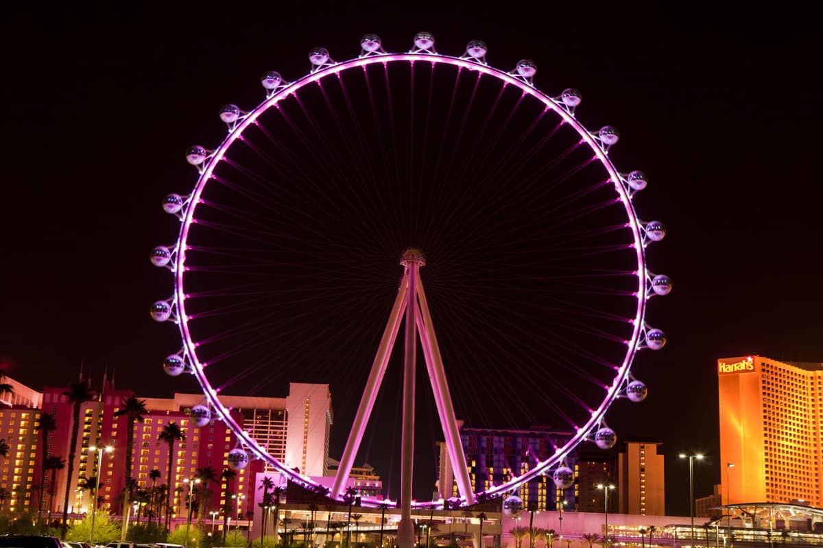 The High Roller Ferris Wheel glowing purple, Discover the World's Tallest Observation Wheel: High Roller Ferris Wheel in Las Vegas