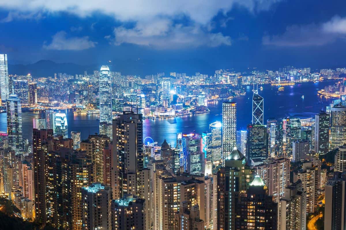Victoria Harbor of Hong Kong city at night.
