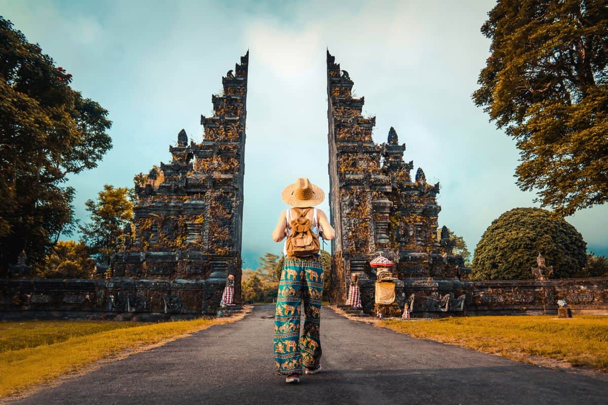 Woman with backpack exploring Bali, Indonesia. - Bali - The Best Destination for Your Next Vacation