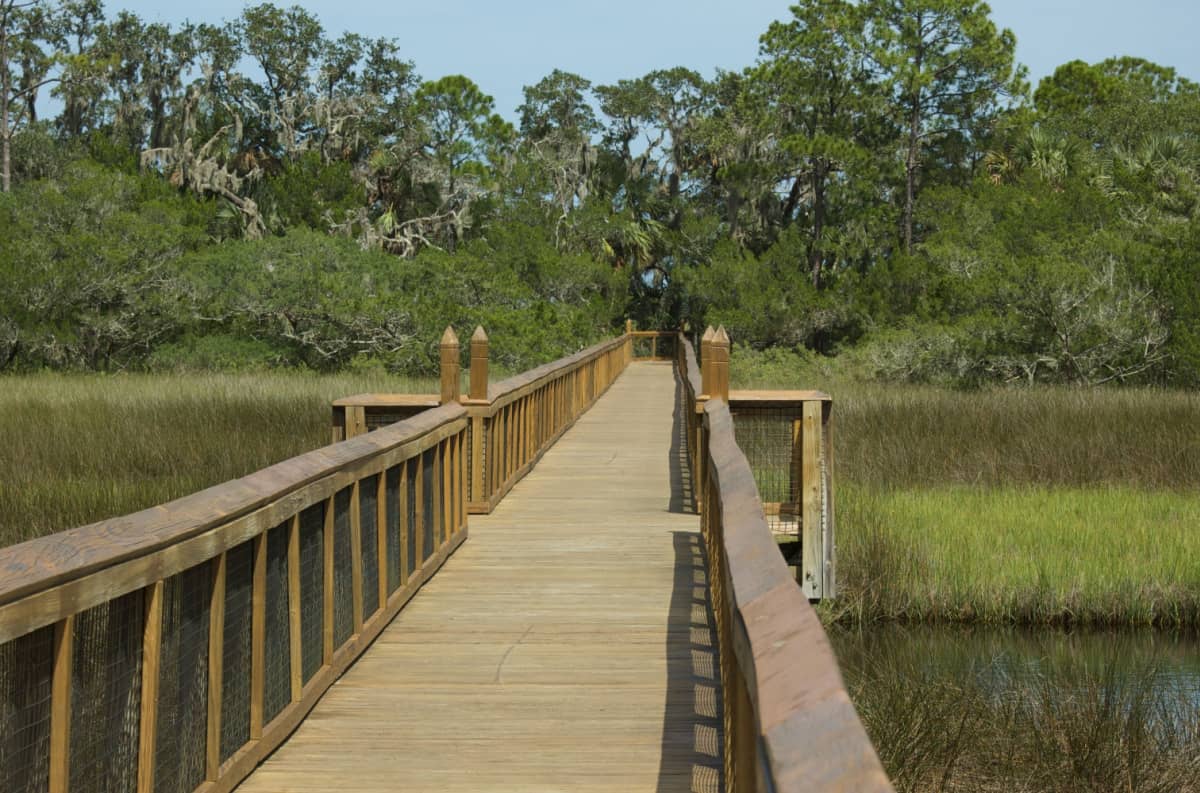 Wooden bridge over water at Fort Mose Historic State Park