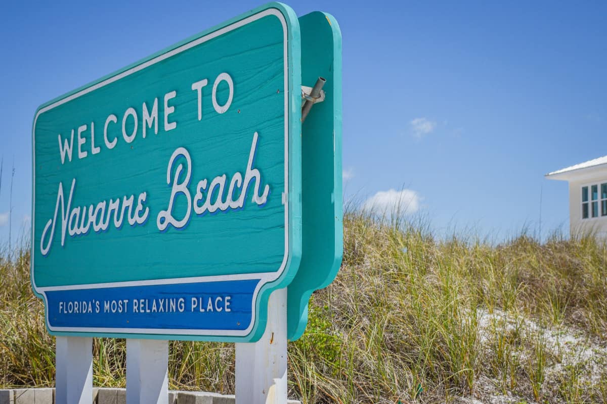 a welcome signage to Navarre Beach
