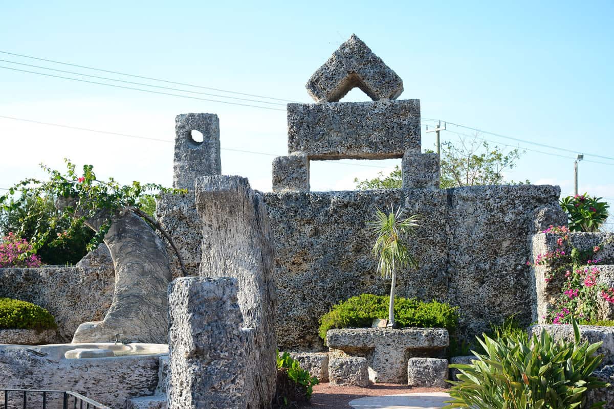 A tall rocky man-made structure at Coral Castle, Florida