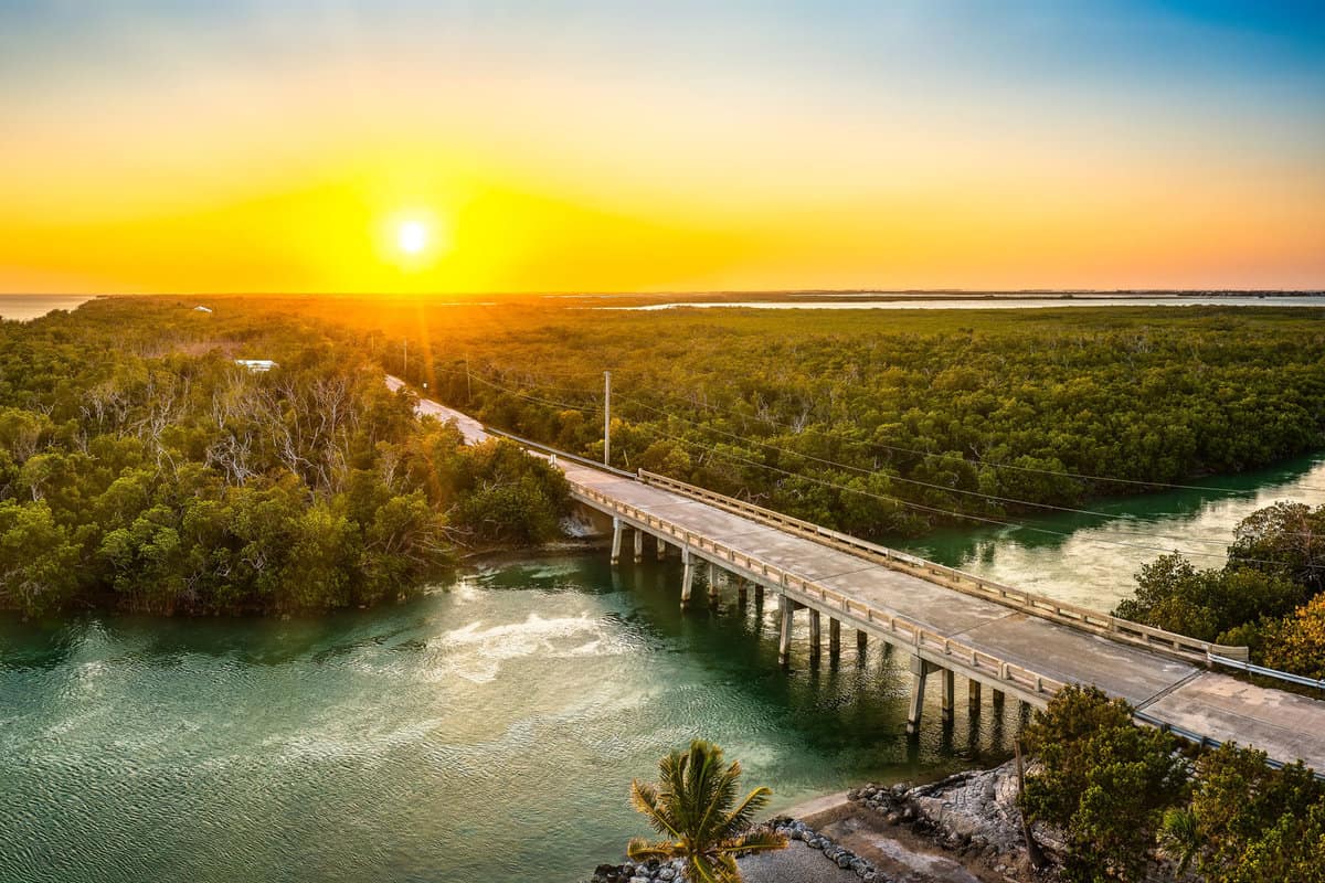 Aerial sunset with the bridge between Sugarloaf and Saddlebunch Keys, above Sugarloaf Creek, in Florida Keys, Florida.

