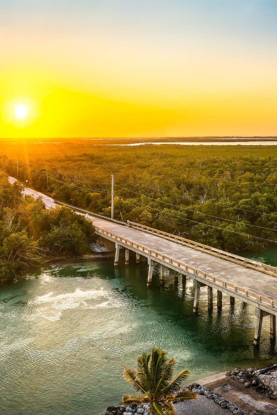 Aerial sunset with the bridge between Sugarloaf and Saddlebunch Keys, above Sugarloaf Creek, in Florida