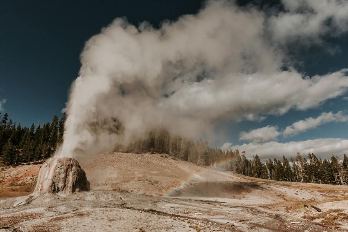 Smoke billowing out of Lone Star Geyser at Yellowstone National Park