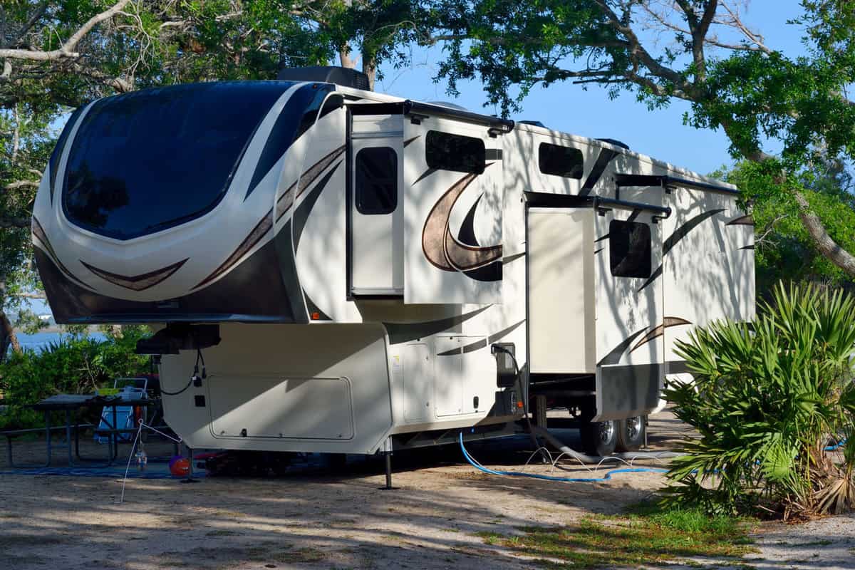 RVs are parked at Kings Kamp RV Park - Experience a royal stay on Stock Island.
