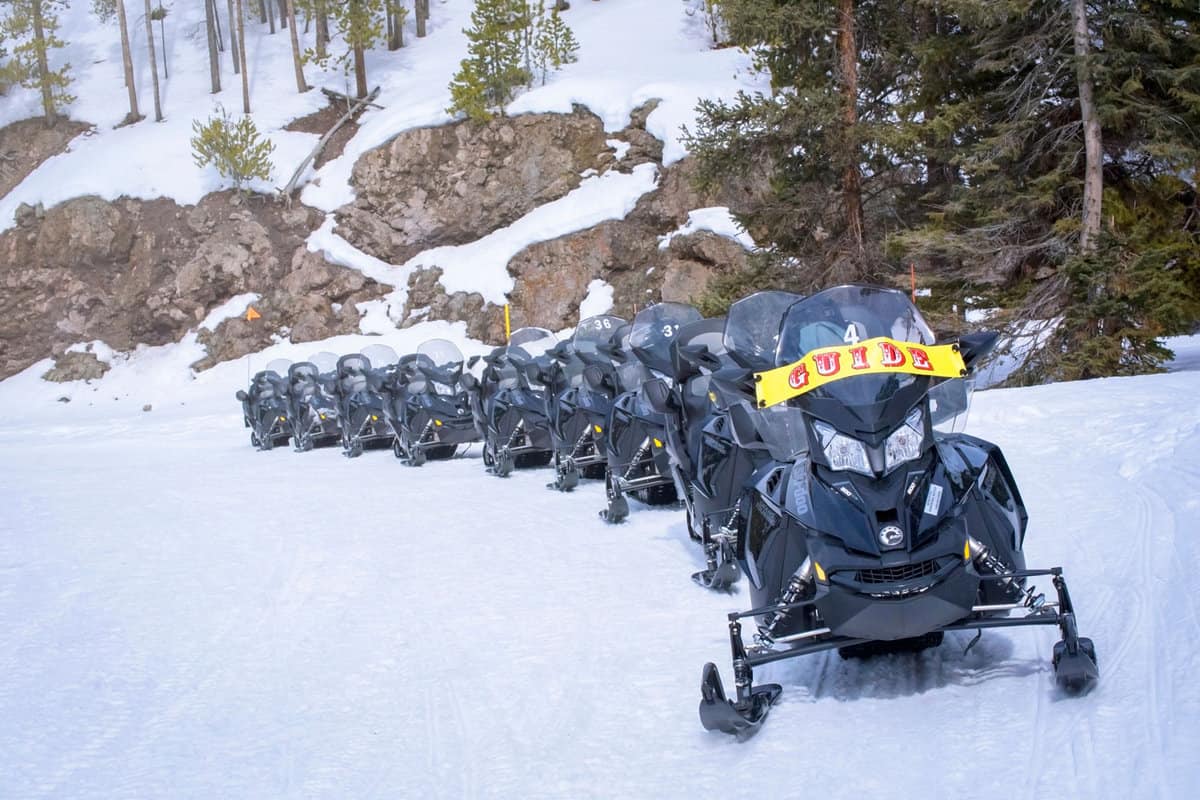 A line of snowmobile guide in Yellowstone