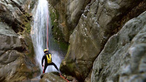 Waterfall rappelling in the gorgeous waterfalls of Yellowstone National Park - 1600x900