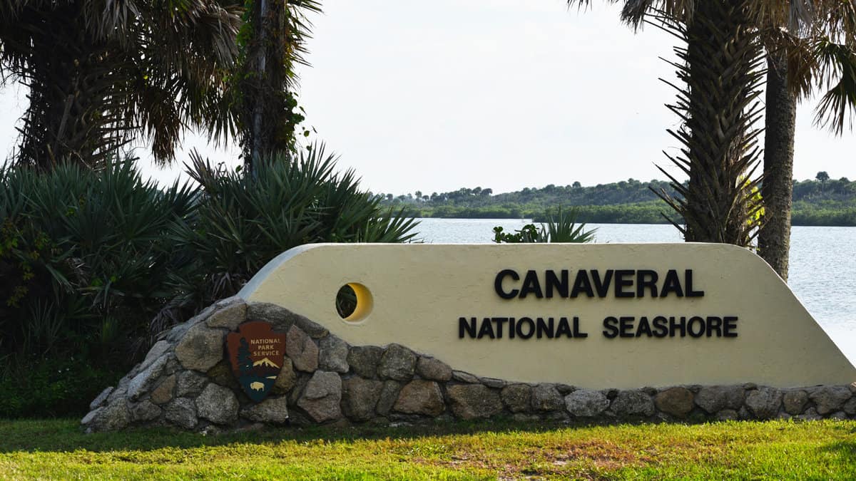 A sign designates the entrance to Canaveral National Seashore, USA