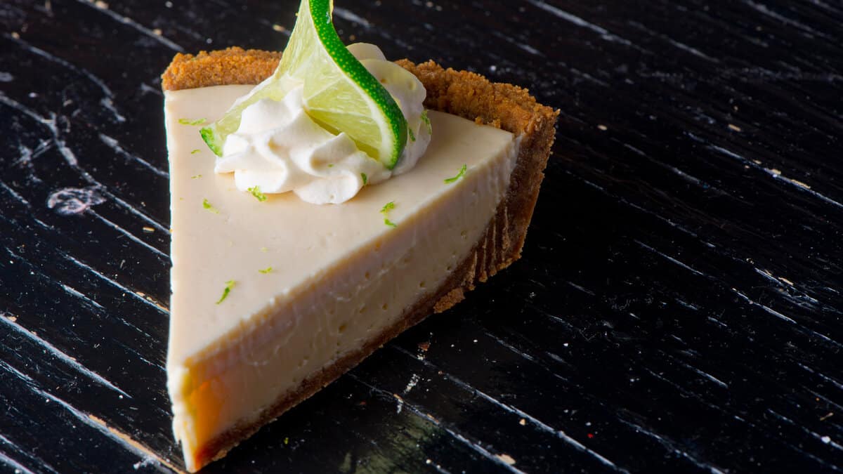 Key lime pie, raw mixture made with the juice from Key West lime juice, condensed milk sugar and eggs poured into graham cracker crust