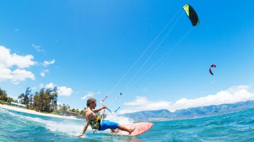 Kite Surfing along the beach in the Keys 1600x900