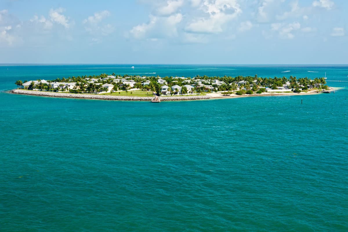 Long aerial drone shot of Sunset Key Cottages in Key West
