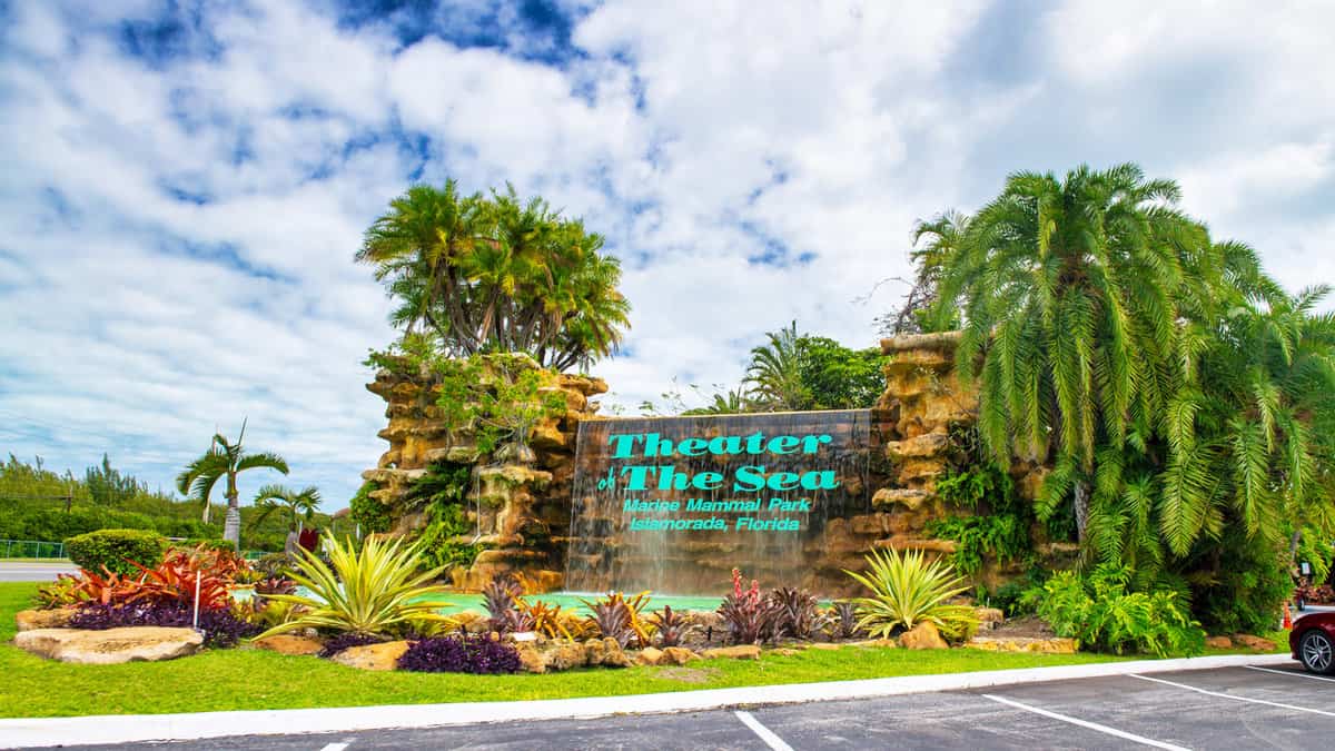 Theater of the Sea entrance sign in the Florida Keys against blue sky