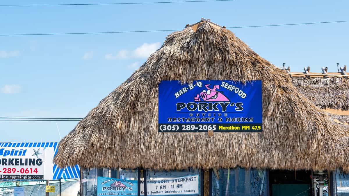 Bar-b-q seafood Porky's bayside restaurant and marina bar, grill entrance, facade on overseas highway, road, US1 in Florida keys