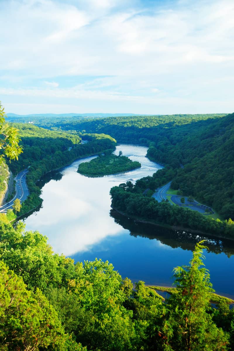 Mountain peak view with blue sky, river and trees from Delaware Water Gap, Pennsylvania.