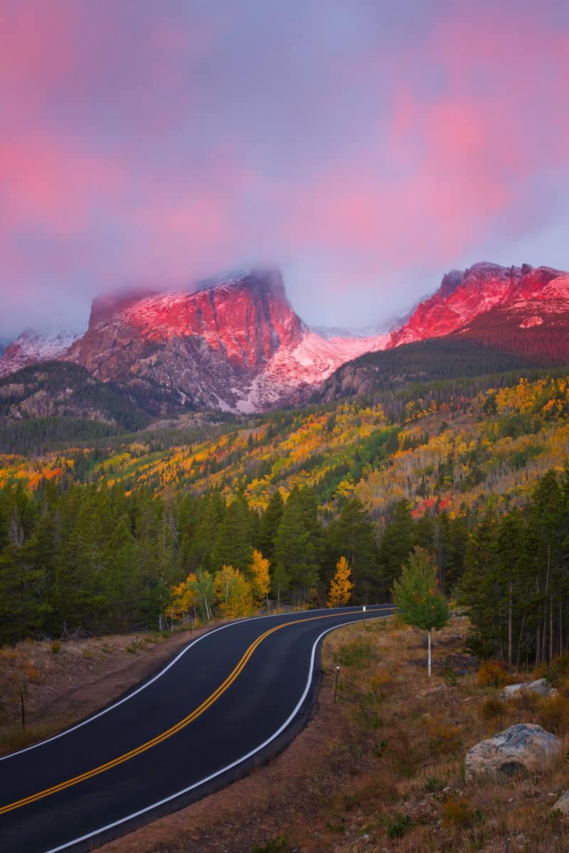 Sunrise on Bear Lake Road in Rocky Mountain National Park as Hallett Peak lights up with the Alpine glow
