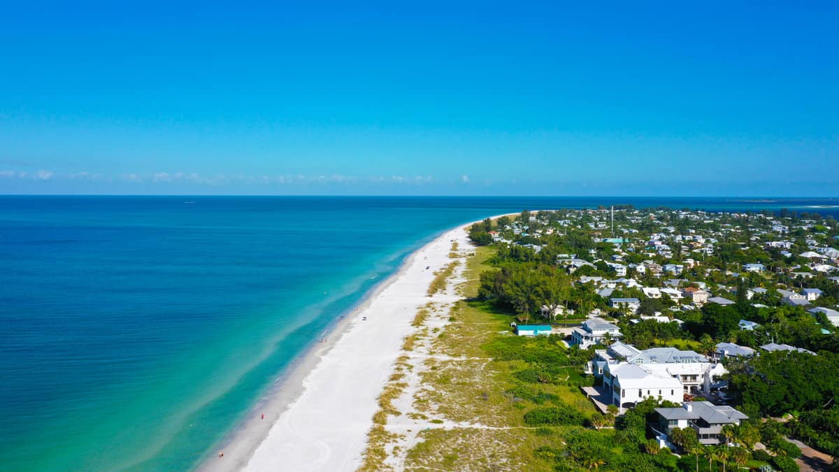 An Aerial View of the Beautiful White Sand Beach on Anna Maria Island, Florida 1600x900