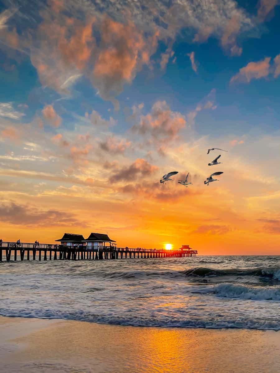 Enchanting Coastal Sunset at Naples Pier, Florida, Captured in Perfect Radiance