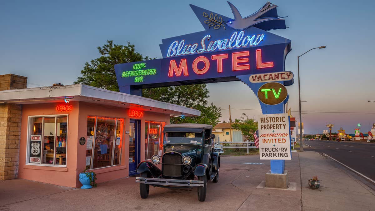 Historic Blue Swallow Motel at sunset This building is listed on the National Register of Historic Places in New Mexico as a part of historic U.S. Route 66 1600x900