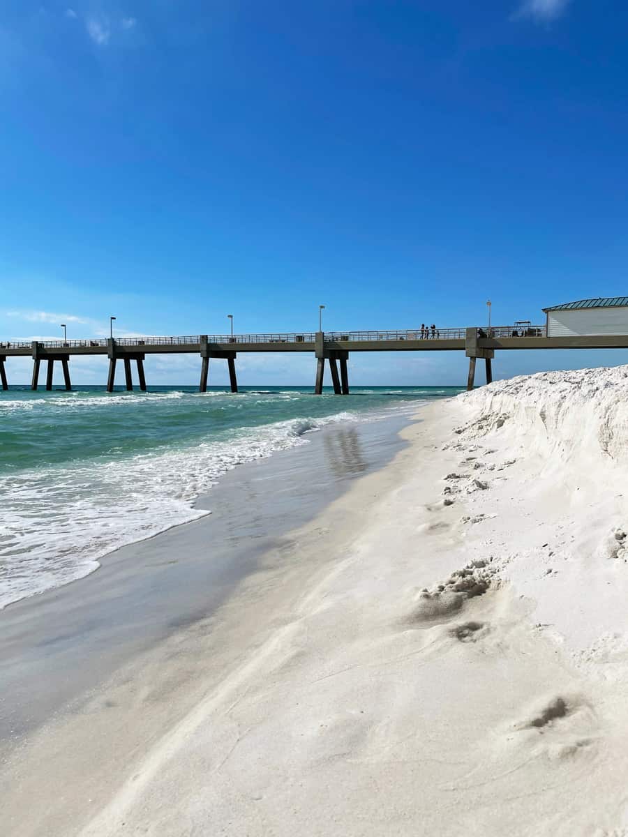 Shoreline at Okaloosa Island with partial view of fishing pier