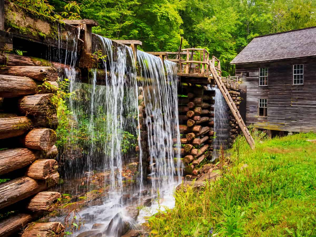 Mingus Mill at the smoky mountains national park with lush spring green and flowing water